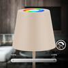 BRILONER Cilano RGBW stolní lampa na baterie IP44, stmívatelná, vč. nabíjecí základny, béžová 7517011