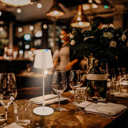 BRILONER Cilano RGBW stolní lampa na baterie IP44, stmívatelná, vč. nabíjecí základny, béžová 7517011